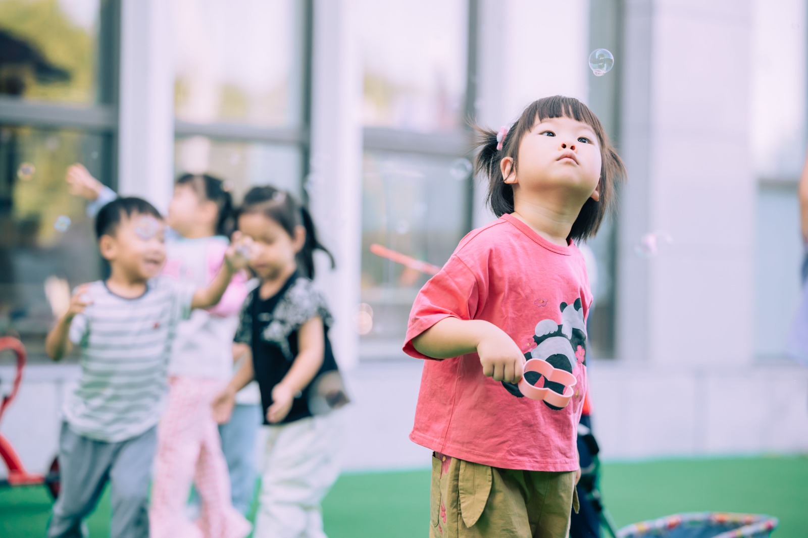 Children learning together in a preschool classroom